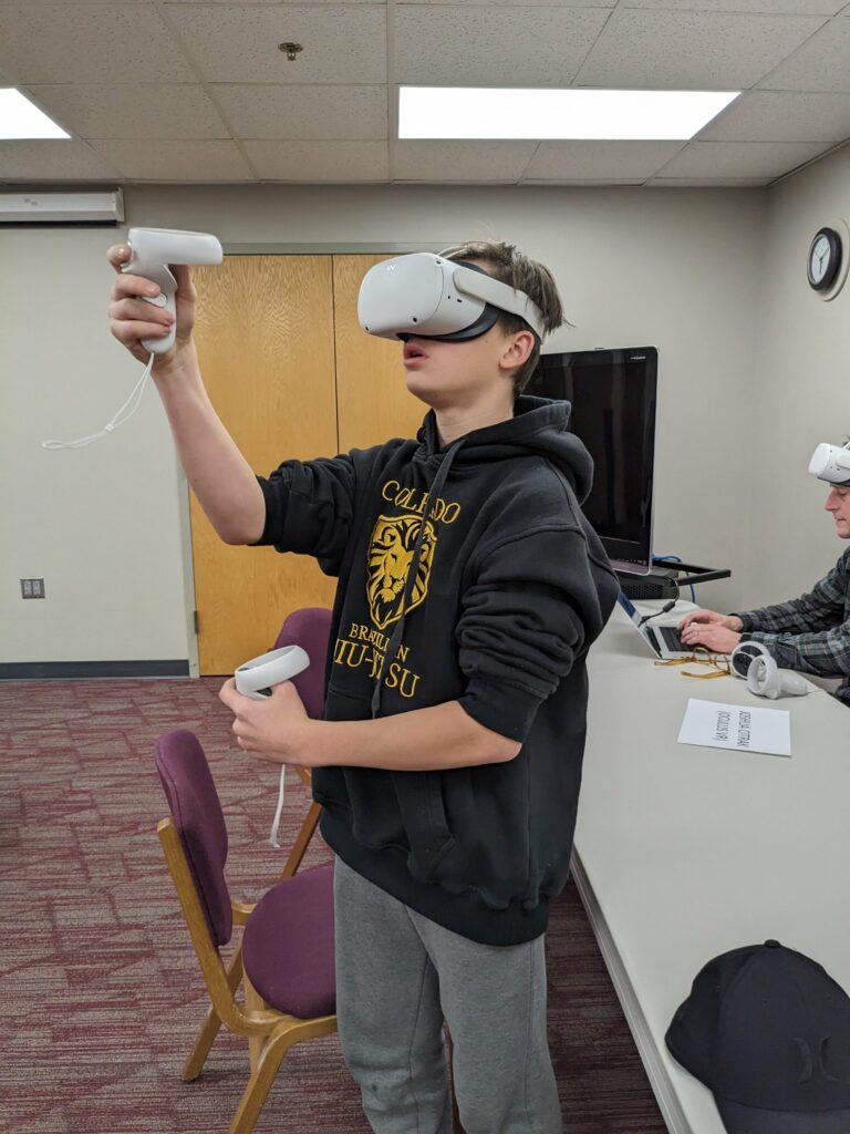Ferran Hernandez, 13, works with a virtual reality program after an emerging technology event Monday, Feb. 27 on the Northern State University campus.