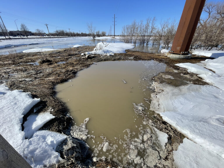 Image of the scene of a water main break north of Milwaukee Avenue Northeast.