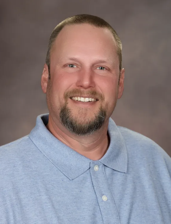 Head and shoulders image of Brown County Commissioner Mike Gage wind power data center