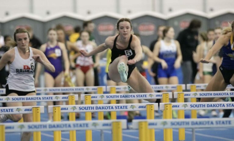 Northern State University's Renea Taylor competes in the hurdles at a South Dakota State University indoor meet in Brookings. Photo courtesy of Gail Stoltenberg