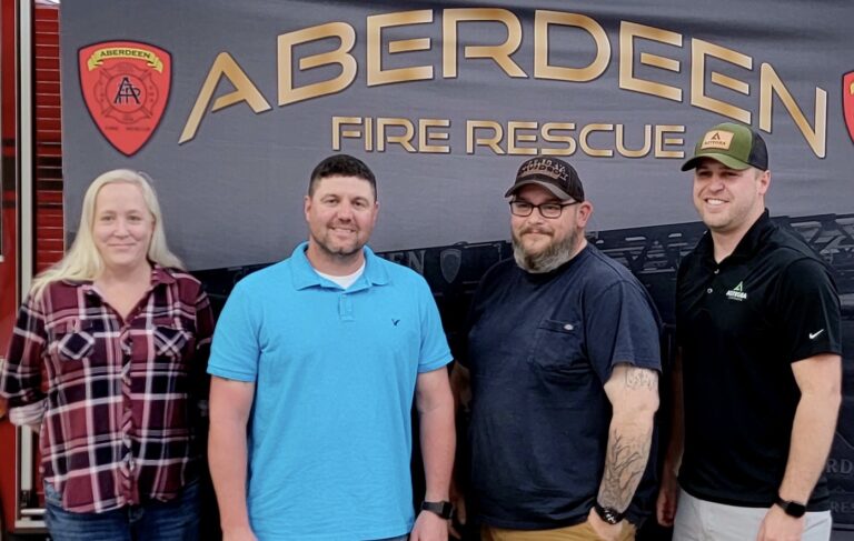 Three employees at Agtegra recently received Citizen's Lifesaving Awards from Aberdeen Fire & Rescue. Pictured are Kelly Craft, left; Cody Bonn, second from left; Chad Bidwell and Shaun Hettich, right. Craft, Bonn and Hettich were honored for helping their coworker Bidwell when he collapsed from cardiac arrest at work. Courtesy photo