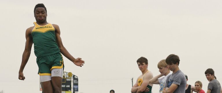 Roncalli senior Jayden Munroe competes in triple jump last week at the Northeast Conference track and field meet in Groton. Photo by Robb Garofalo
