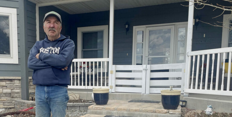 Joe Norman stands outside his ranch home in western Meade County on a quiet day in April. Norman is fighting a state government plan to open a large gun range across the road from his property that he says will bring near-constant sounds of gunfire into his rural lifestyle. South Dakota News Watch photo by Bart Phankuch