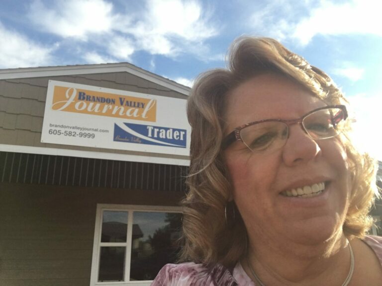 Jill Meier, publisher/editor of the Brandon Valley Journal newspaper, smiles for a selfie outside the newspaper offices in Brandon. Photo courtesy of Jill Meier