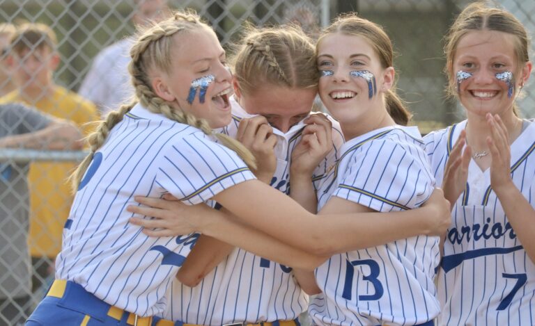 Castlewood teammates celebrate after winning the Class B state softball championship Saturday, June 3 at Players Softball Complex in Aberdeen. Photo courtesy of South Dakota Public Broadcasting