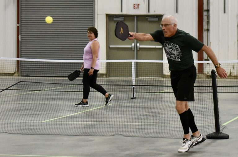 Neil Schaunaman returns a shot during the third-place game in the intermediate division of the Pickle on the Prairie pickleball tournament Saturday, June 10 at the Holum Expo Building. Aberdeen Insider photo by Scott Waltman