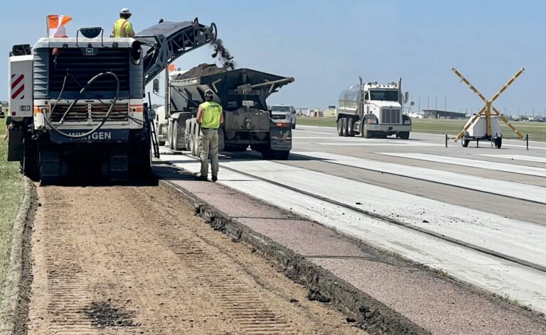 Industrial Builders of Fargo, N.D., was busy Tuesday, June 20 milling the old asphalt from the shoulders of the primary runway at the Aberdeen Regional Airport. Aberdeen Insider photo by Elisa Sand