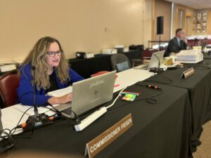 ublic Utilities Commissioner Kristie Fiegen participates in a hearing July 25, 2023, in Fort Pierre on a permit application for the proposed Heartland Greenway carbon dioxide pipeline. South Dakota Searchlight photo by Joshua Haiar