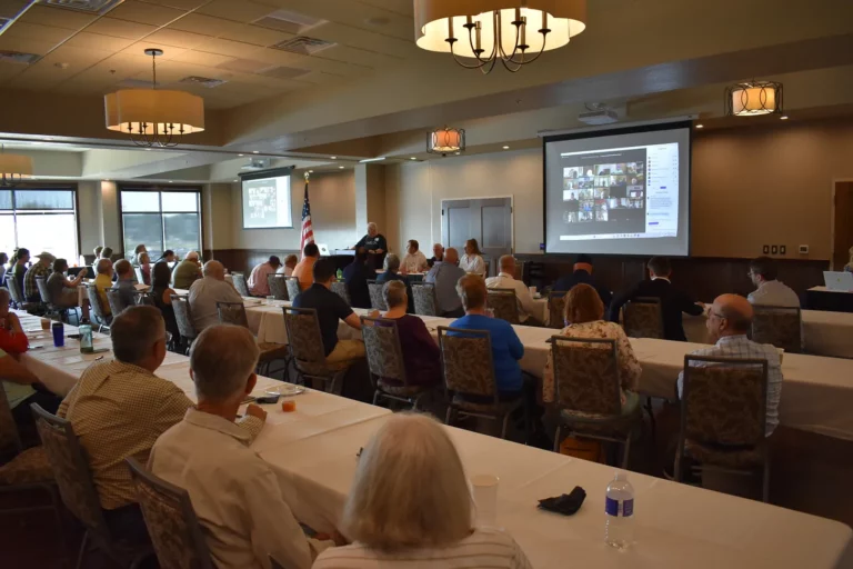 Members of the South Dakota Democratic Party debate a measure to recall former state party Chair Jennifer Slaight-Hansen. Dakota Scout photo by Austin Goss