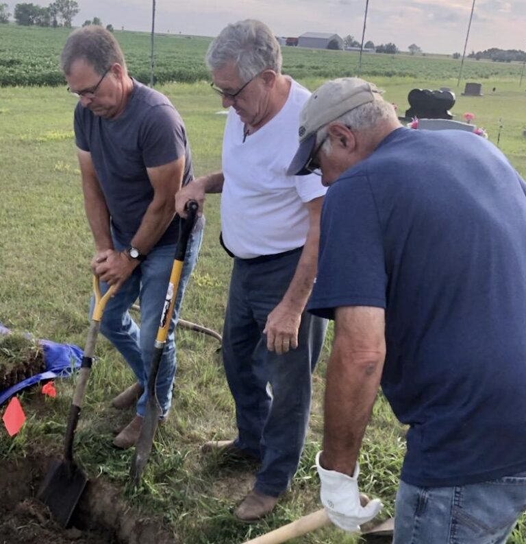 The brothers of Pete Feickert hand dug a grave for their father, Pete Feickert, in a cemetery near Ipswich. Courtesy photo