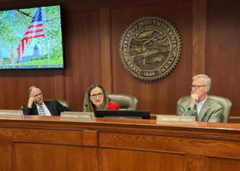 South Dakota Public Utilities Commissioners, from left, Chris Nelson, Kristie Fiegen and Gary Hanson participate in a meeting Sept. 6, 2023, at the Capitol in Pierre. South Dakota Searchlight file photo by Joshua Haiar