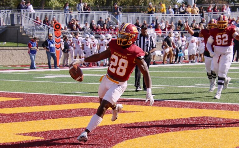 Northern State University's Stanley Haskins Jr. celebrates after his 1st quarter touchdown against Minot State Saturday, Oct. 7 at Dacotah Bank Stadium. Aberdeen Insider photo by Robb Garofalo