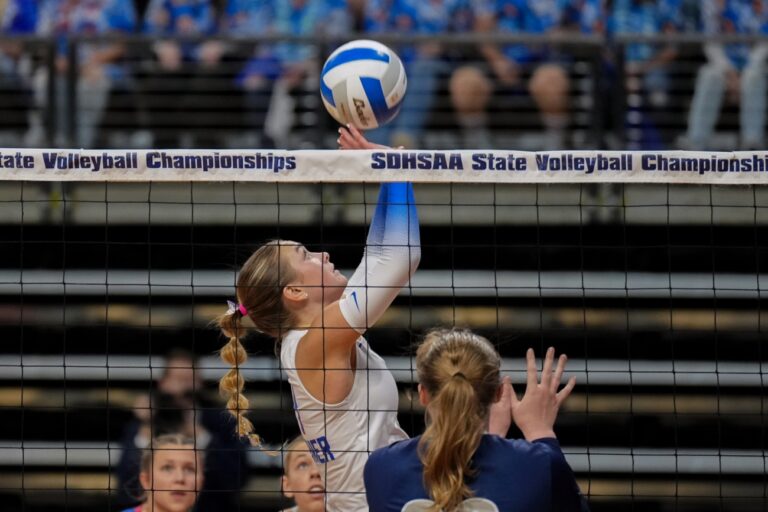 Warner's Ava Nilsson sets the ball during the Class B state tournament in Rapid City. She was named to the Class B All-State team. Photo courtesy of South Dakota Public Broadcasting