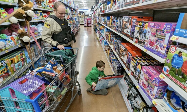 About 50 young people from the Aberdeen area got to Shop With a Cop Saturday, Dec. 2 at Walmart. Aberdeen Insider photo by Scott Waltman