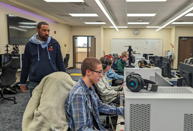 Central High School esports coach Andre Cobbs, left, and Ethan Goetz work during a recent practice. Photo courtesy of Central High School