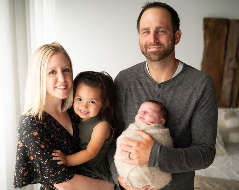 Keri and Tony Satrang hold their children Nora and Crue. They adopted by children Courtesy photo