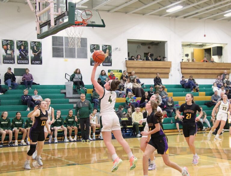 Aberdeen Roncalli's Maddie Huber scores on a layup against Herreid/Selby Area Friday, Dec. 22 in the Roncalli Gym. Aberdeen Insider photo by Robb Garofalo