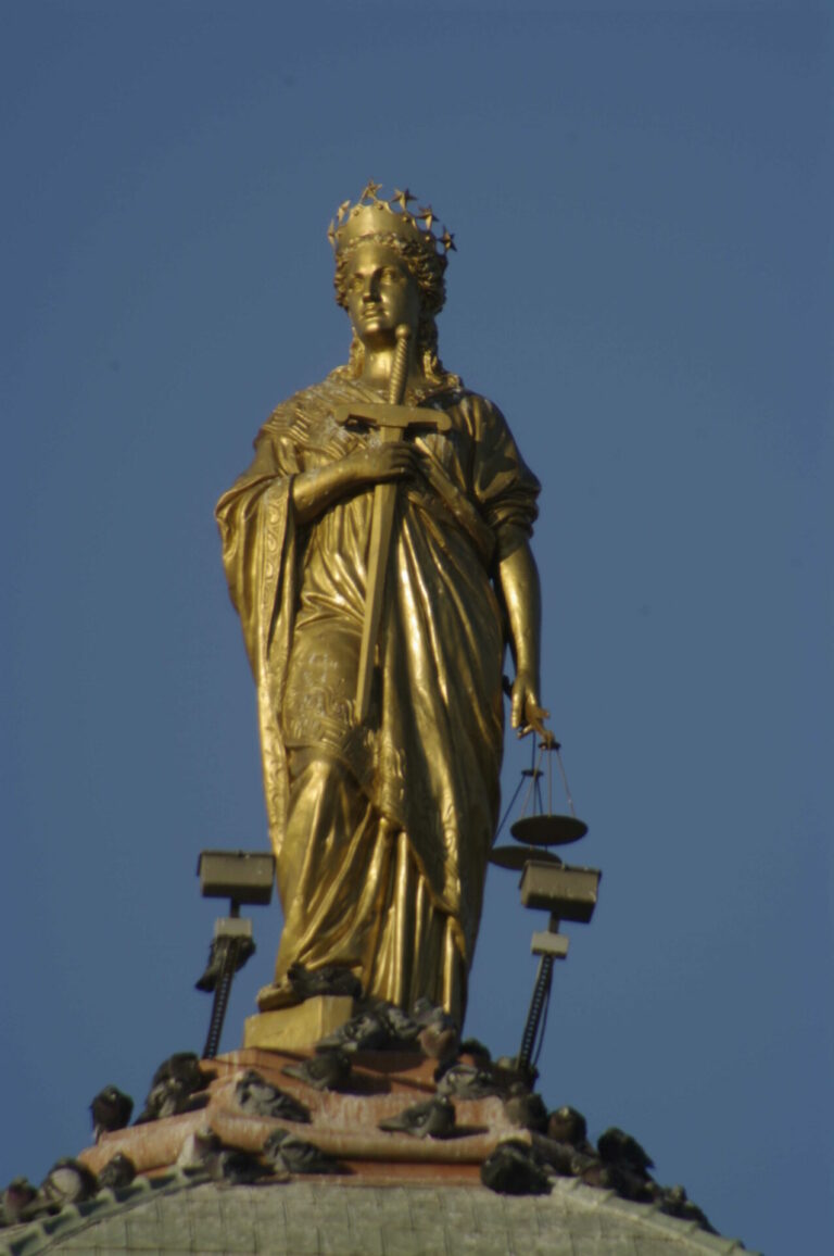 The Lady Justice statue at the top of the Brown County Courthouse dome will be repaired as part of a 2024 project. Now, she is only holding one scale. Aberdeen Magazine file photo