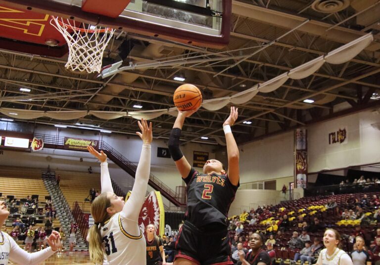 Northern State's Madelyn Bragg takes a jump shot over Augusta's Katelyn Diegnau during the second quarter of their game Saturday, Jan. 13 in Wachs Arena. Aberdeen Insider photo by Robb Garofalo