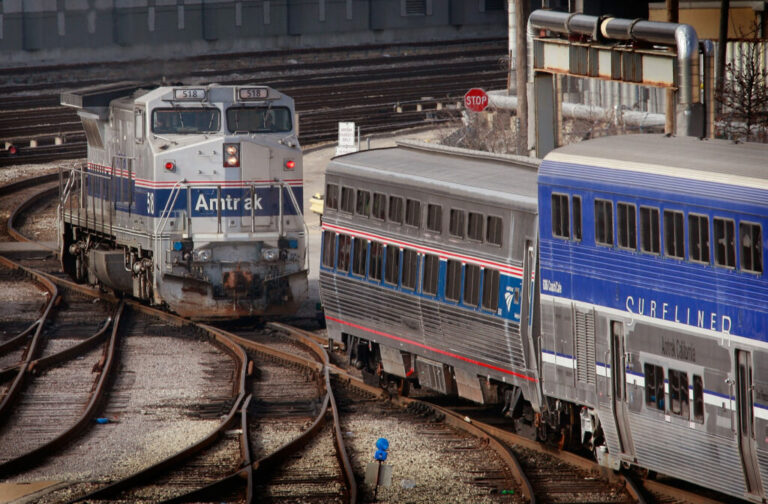 An Amtrak engine moves through a rail yard on the southern edge of downtown Chicago. South Dakota and Wyoming are the only states in the contiguous U.S. that don't have Amtrak service. Getty Images photo by Scott Olson