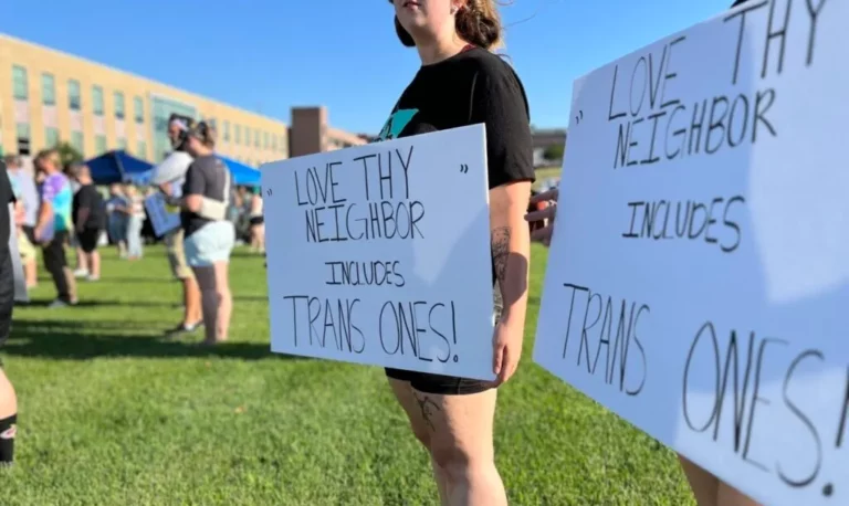 Opponents of the state’s ban on gender-affirming health care for transgender children gather at Van Eps Park in downtown Sioux Falls on July 28, 2023. The protesters called for state lawmakers to repeal the ban. South Dakota Searchlight file photo by Joshua Haiar