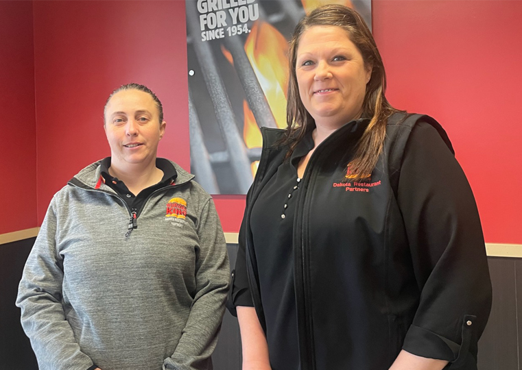 Burger King general manager Heather Moberley, left, stands with Jen Dirk, owner and operator of Dakota Restaurant Partnership, which owns a group of 14 Burger Kings including Aberdeen. Aberdeen Insider photo by Elisa Sand