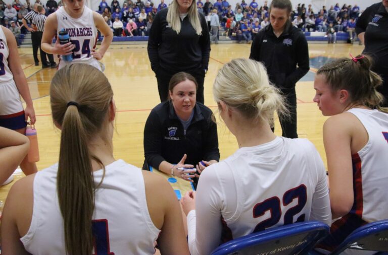 Warner head girls basketball coach Tina Winter addresses her team during a timeout against Groton Area on Jan. 1 at he Warner Gym. Aberdeen Insider photo by Robb Garofalo