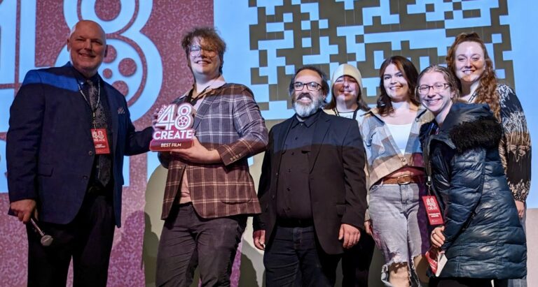 "Vile," directed by John Schwab, won Best Film and People's Choice honors at the 48 Create film competition last weekend in Aberdeen. Pictured, from left, are 48 Create emcee Courtney Rott, Schwab and "Vile" cast members Tony Kollman, Jensen Eckart, Kylee Carlson, Kayleen Hermans, Hayley Salem. Aberdeen Insider photo by Scott Waltman
