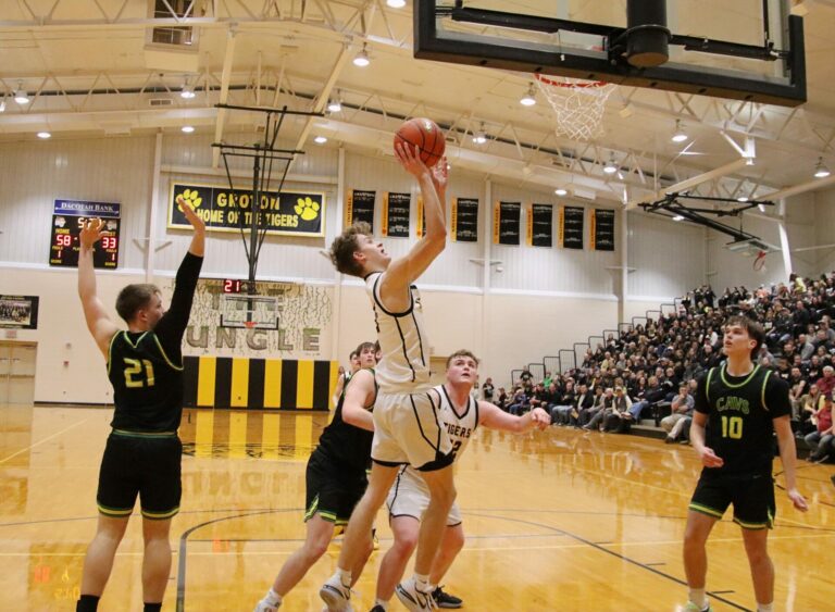 Groton Area's Ryder Johnson drives and scores during the fourth quarter of their Region 1A boys basketball game against Aberdeen Roncalli Friday, March 1 in the Groton Gym. Aberdeen Insider photo by Robb Garofalo