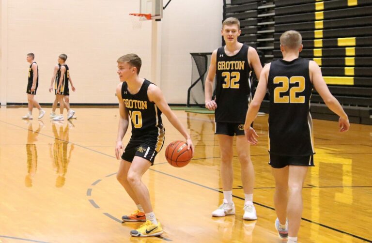 Groton Area's Lane Tietz, left, Gage Sippel, and Jacob Zak loosen up during basketball practice inside the Groton gym. Aberdeen Insider photo by Robb Garofalo