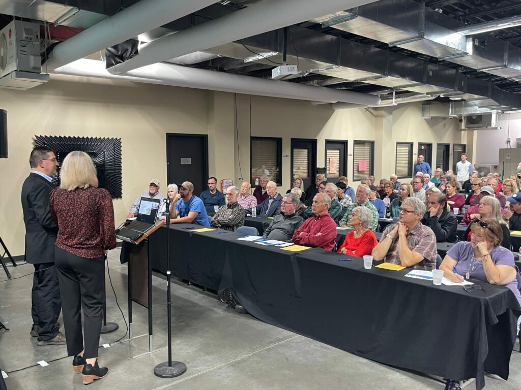 Rick Weible and Jessica Pollema give a presentation to Concerned Citizens of Lincoln County at an October 2023 event in Sioux Falls, S.D. “If you want to get rid of election deniers, you have to let them be part of the process,” Weible said. South Dakota News Watch file photo