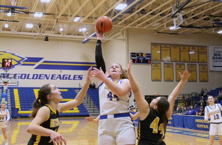 Aberdeen Central's Taryn Hermansen takes a jump shot in the lane against Mitchell's Brianna Kersch during their game Tuesday, Feb. 6 inside Golden Eagles Arena. Aberdeen Insider photo by Robb Garofalo