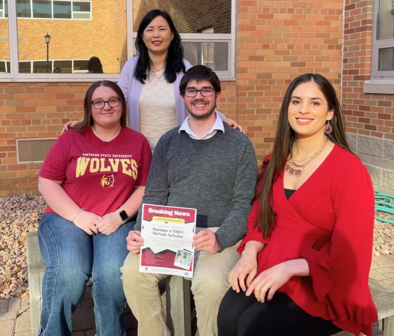 C Chiara Wang, back row, director of the Ronald McNair Post Baccalaureate Program at Northern, stands with the first three students admitted as McNair Scholars at Northern. They are Kaitlynn Harmon, Braden Freeman and Lauren Nikolas. Aberdeen Insider photo by Elisa Sand.
