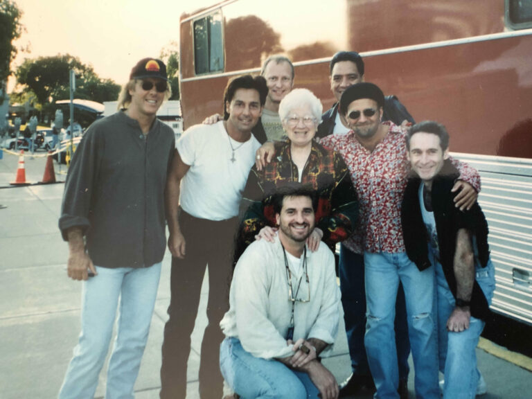 Terry Finley, front, and his mother, Barbara (Lowenstein) Finley, with members of the Little River Band. Photo courtesy of Terry Finley.