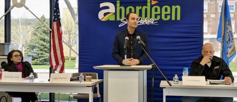 Logan Manhart speaks during a District 1 House of Representatives candidate forum for Republican candidates Saturday, May 4 at K.O. Lee Aberdeen Public Library. To the left is Tamara St. John and to the right is Chris Reder, the other candidates. Aberdeen Insider photo by Scott Waltman.