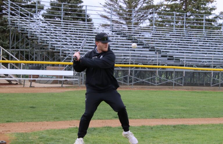 Aberdeen Smittys head coach Nate Gonnelly hits a ground ball during practice Tuesday, May 7 at Fossum Field. Aberdeen Insider photo by Robb Garofalo.