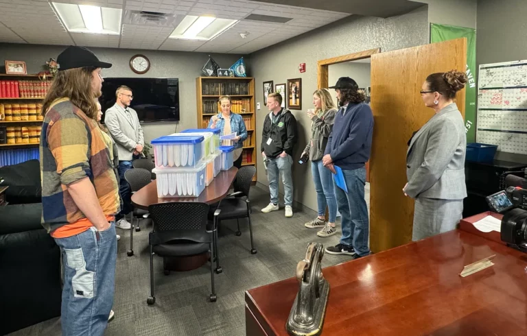 Members if South Dakotans for Better Marijuana Laws turn petitions at the state Capitol in Pierre on Tuesday, May 6. Dakota Scout photo by Austin Goss.