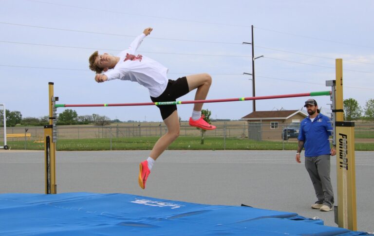 Aberdeen Central's Brendan Phillips goes over the bar during high jump practice Monday, May 20. Aberdeen Insider photo by Robb Garofalo