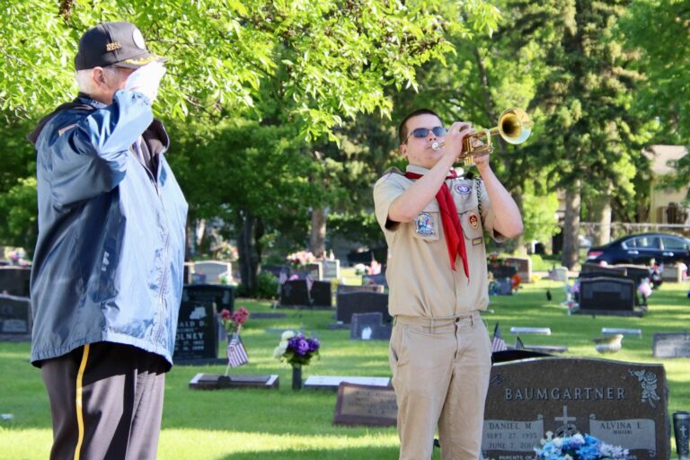 Caiden Siebert, a Boy Scout from Aberdeen, plays "Taps" during a Memorial Day ceremony Monday, May 27 at St. Mary's Catholic Cemetery. Aberdeen Insider photo by Scott Waltman.