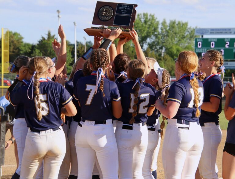 Members of the Tea Area softball team celebrate their Class A state softball championship over West Central Saturday, June 1 at Players Field Complex. Aberdeen Insider photo by Robb Garofalo.