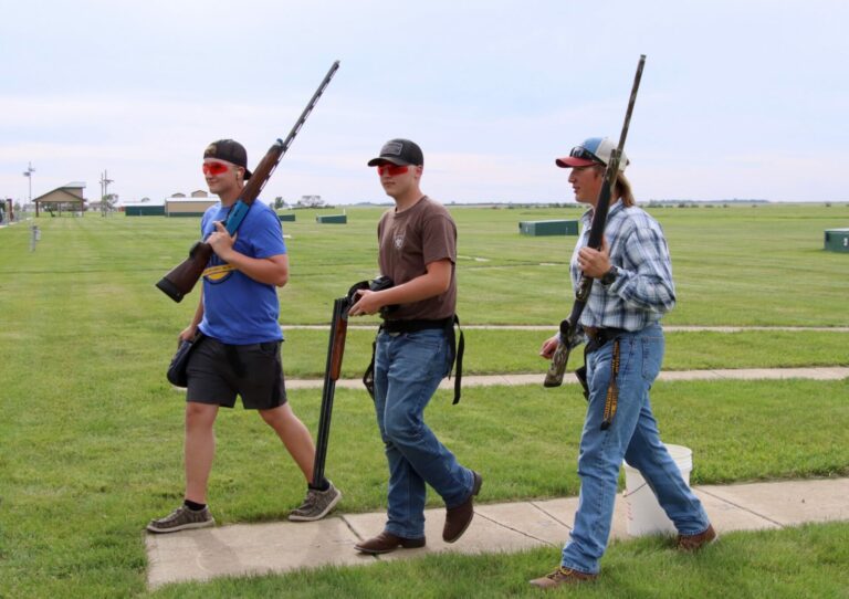Aberdeen Central's Austin Sprinkle, left, Caden Kirnan and Russ Wahlberg walk off the range during trap practice Monday, June 3 at the Aberdeen Gun Club. Aberdeen Insider photo by Robb Garofalo.