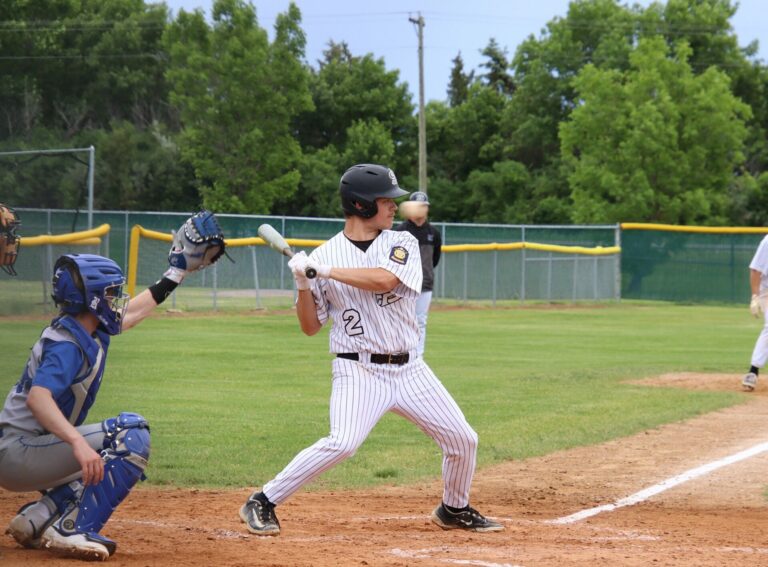 Aberdeen Smittys first baseman Ben Livermont watches a pitch zip right past his face during the third inning against Renner Post 307 Tuesday, June 4 at Fossum Field. Aberdeen Insider photo by Robb Garofalo.