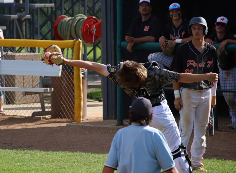 Aberdeen Smittys catcher Lance Siefken leans back and makes a grab behind the plate during the top of the fifth inning against Huron Saturday, June 29 at Fossum Field. Aberdeen Insider photo by Robb Garofalo.