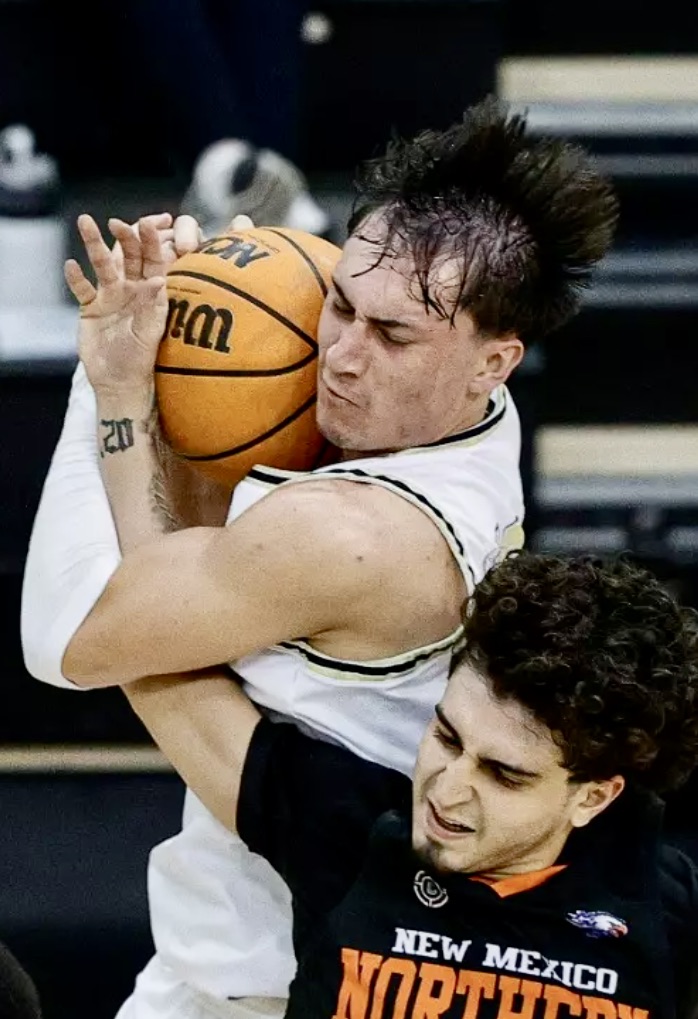 Noah Bacca, with the basketball, is transferring from the University of Colorado Colorado Springs to play mens basketball at Northern State University. Photo courtesy of UCCS.