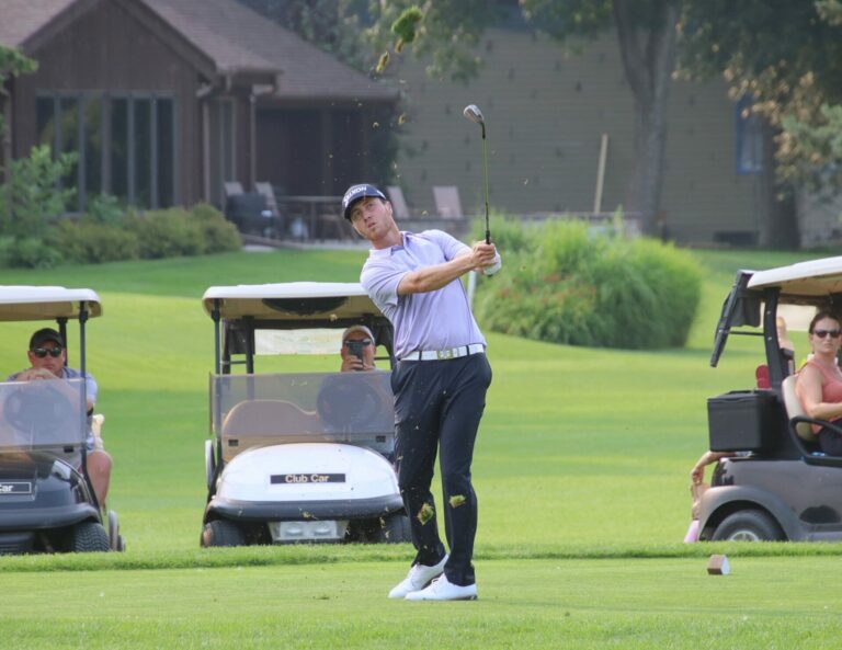 Jonah Dohrer hits a chip shot towards the hole on the 18th green during the final round of the Western Printing Pro-Am Sunday, July 21 at Moccasin Creek Country Club. Aberdeen Insider photo by Robb Garofalo.