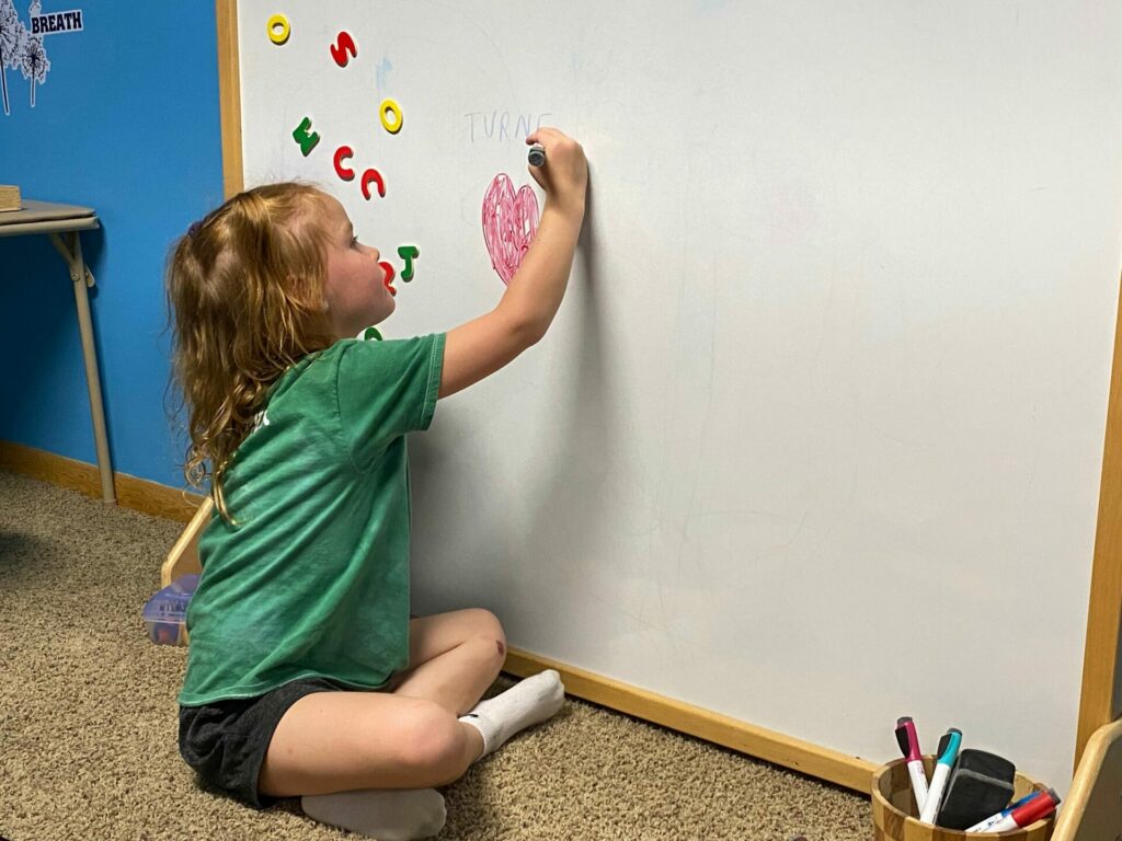 Kids respond to sensory room at Lighthouse Preschool 2 Turner Gatzemeyer draws on the whiteboard in the sensory room in the Lighthouse Preschool in Aberdeen. Photo by Sam Schauer for The Aberdeen Insider.