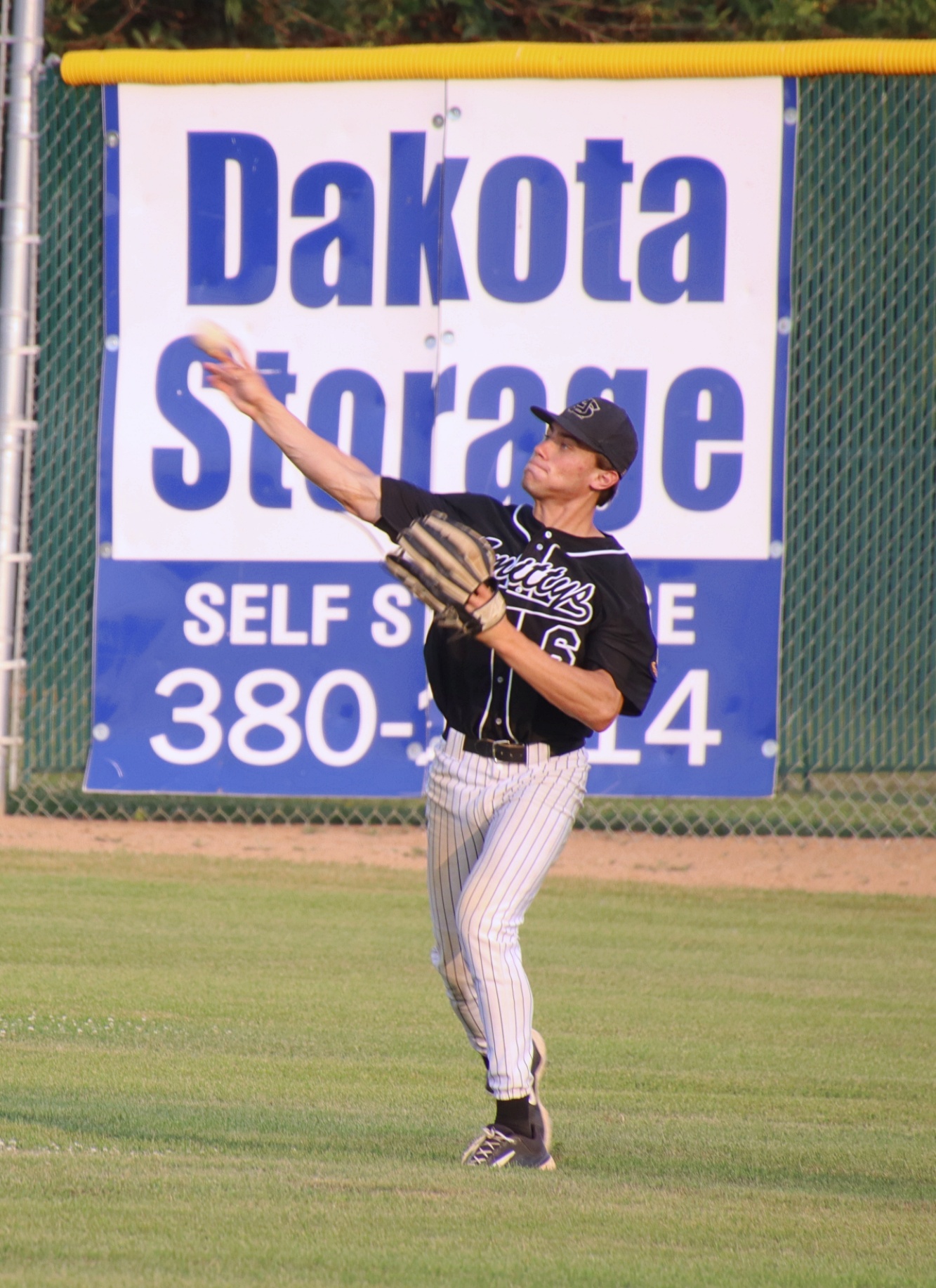 Smittys season ends after extra innings loss to Brandon Valley 4 Drew Salfrank turns and throws to third from center field during Game 1 of the Aberdeen Smittys region tournament series against Brandon Valley Thursday, July 25 at Fossum Field. Salfrank completes double play after making a catch. Aberdeen Insider photo by Robb Garofalo.