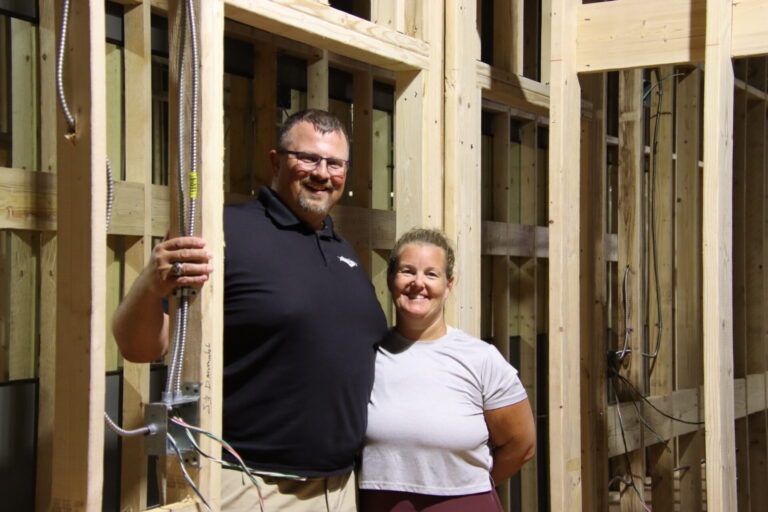 Lee and Christine Keller pose for a photo during the construction of their soon-to-be business, The Sweat Zone. Aberdeen Insider Photo by Shannon Marvel.