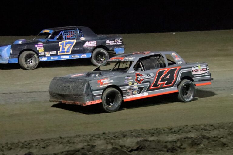 Maria Broksieck (14) overtakes Matt Goth during the Street Stocks feature race Saturday, Aug. 24 at the Brown County Speedway. Aberdeen Insider photo by Robb Garofalo.