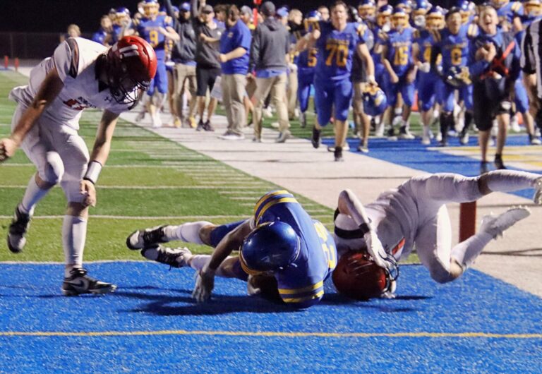 Aberdeen Central's Cordell Rychlik dives into the end zone after an interception against Brookings Friday, Sept. 13 at the Brownell Activities Complex. Rychlik has signed to play college football at Northern State. Aberdeen Insider photo by Robb Garofalo.
